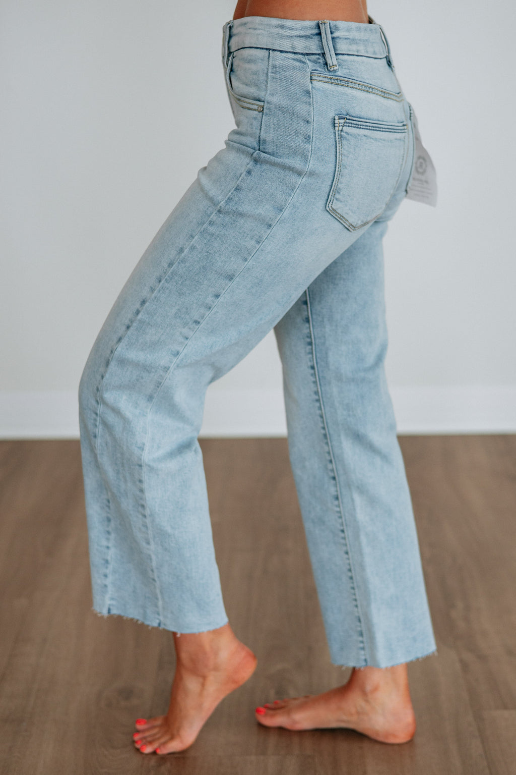 Mid Rise Slouchy Wide Leg Raw Hem Ankle Jeans in Light Wash Cotton