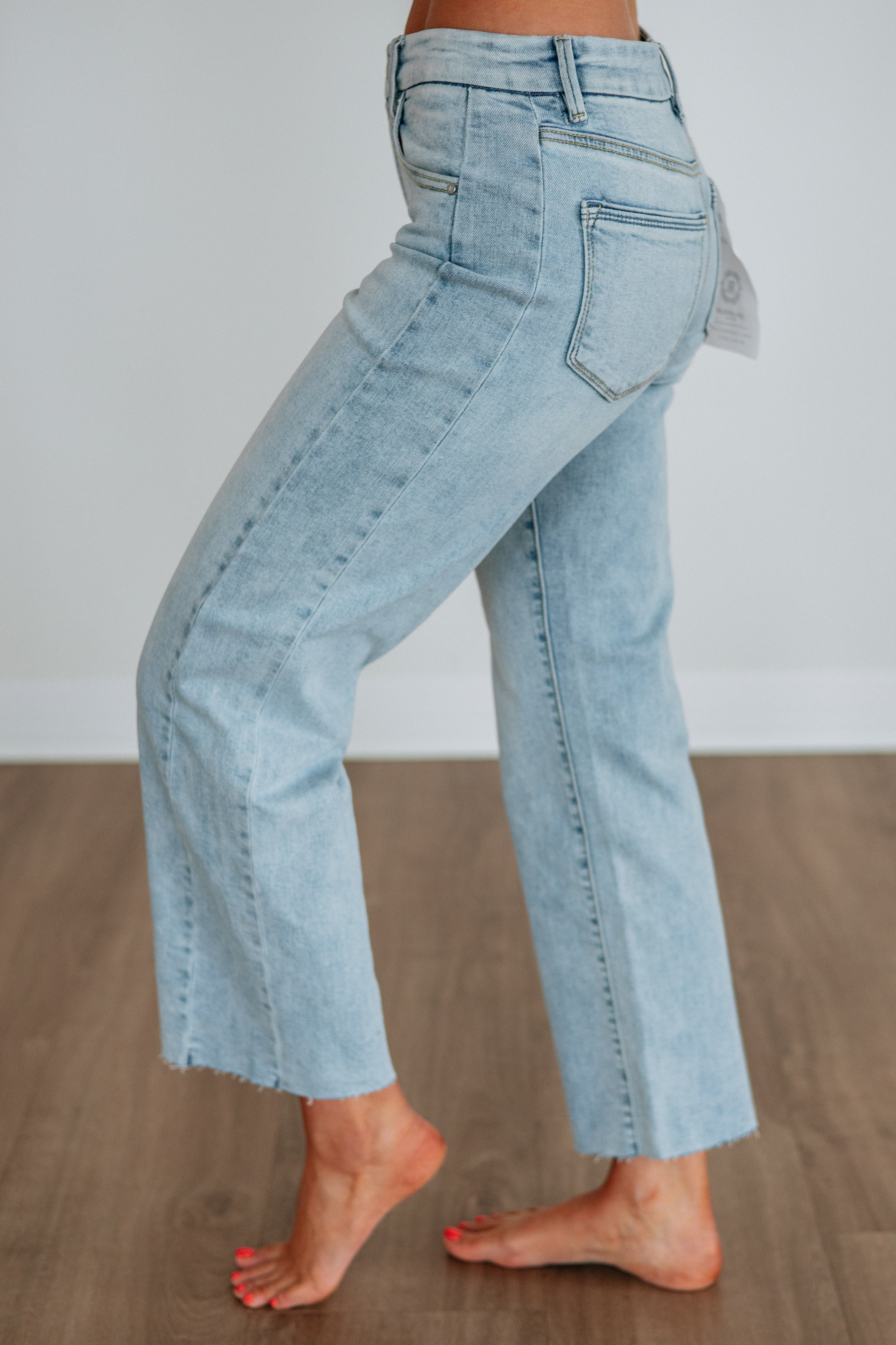 Mid Rise Slouchy Wide Leg Raw Hem Ankle Jeans in Light Wash Cotton