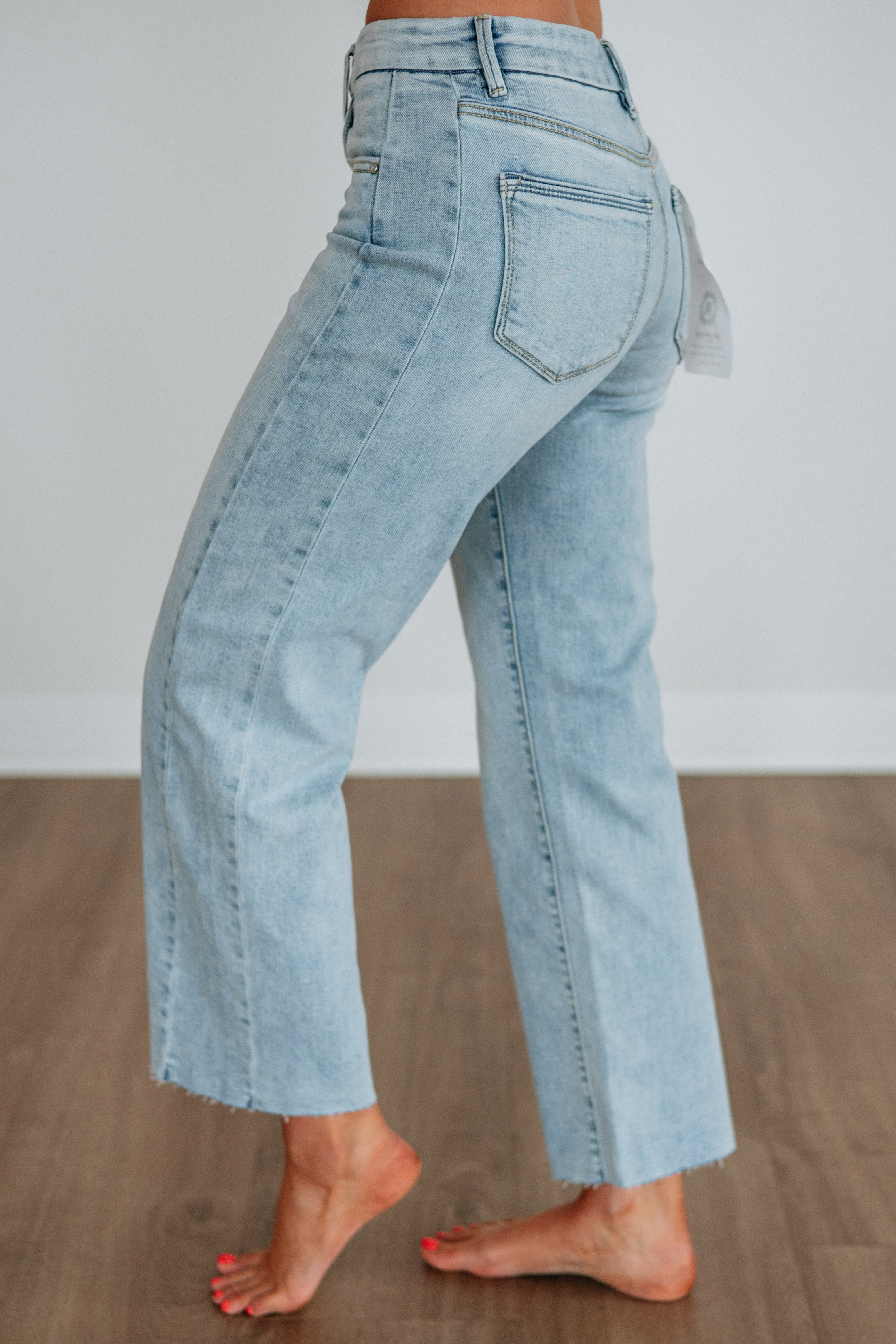 Mid Rise Slouchy Wide Leg Raw Hem Ankle Jeans in Light Wash Cotton