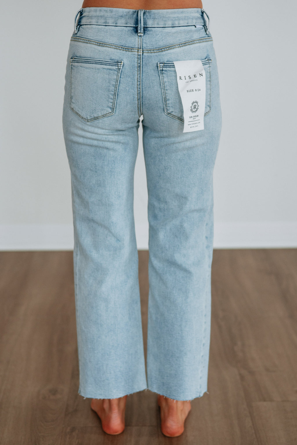 Mid Rise Slouchy Wide Leg Raw Hem Ankle Jeans in Light Wash Cotton