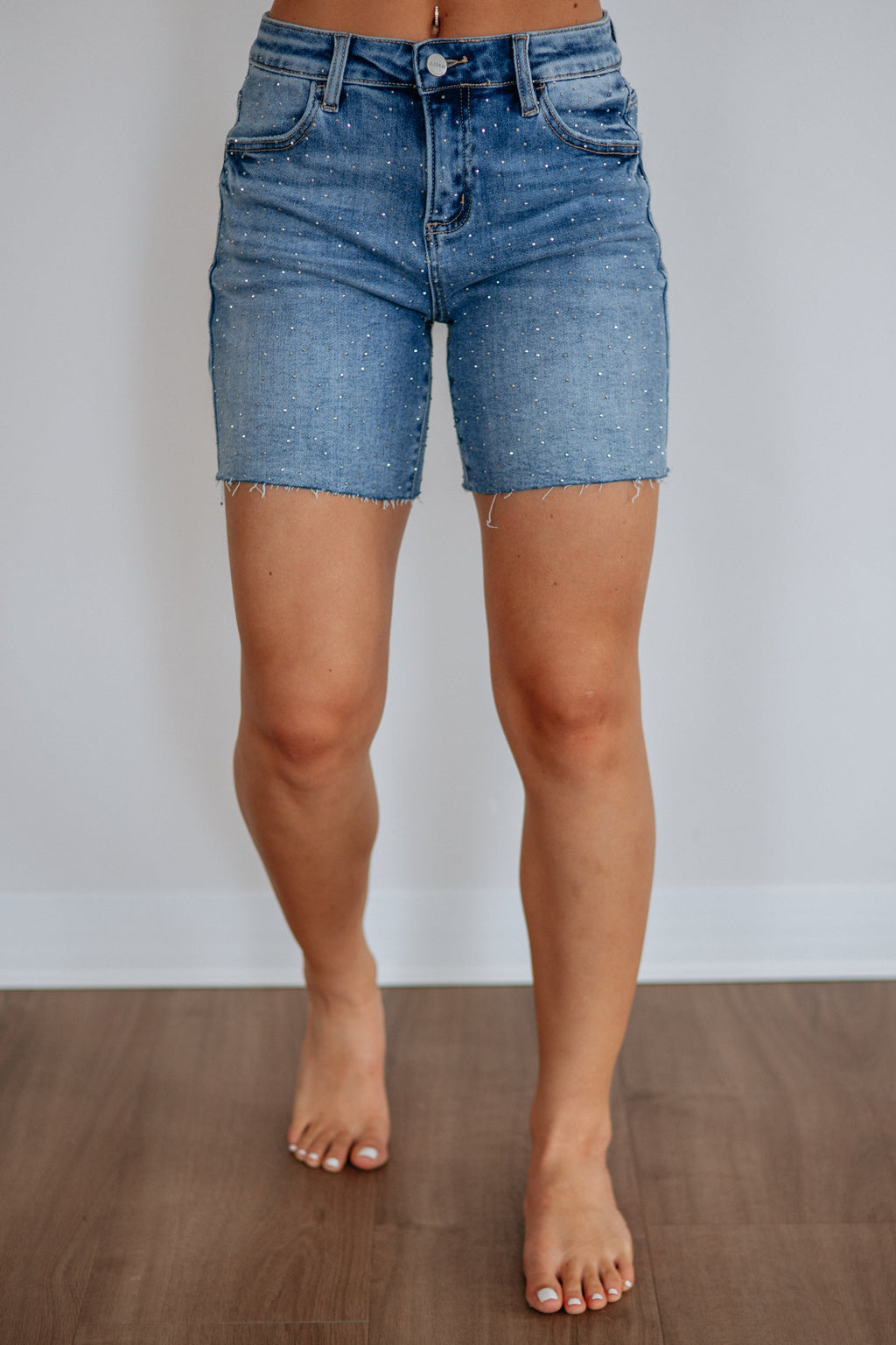 High Rise Rhinestone Mid-Length Denim Shorts in Medium Wash