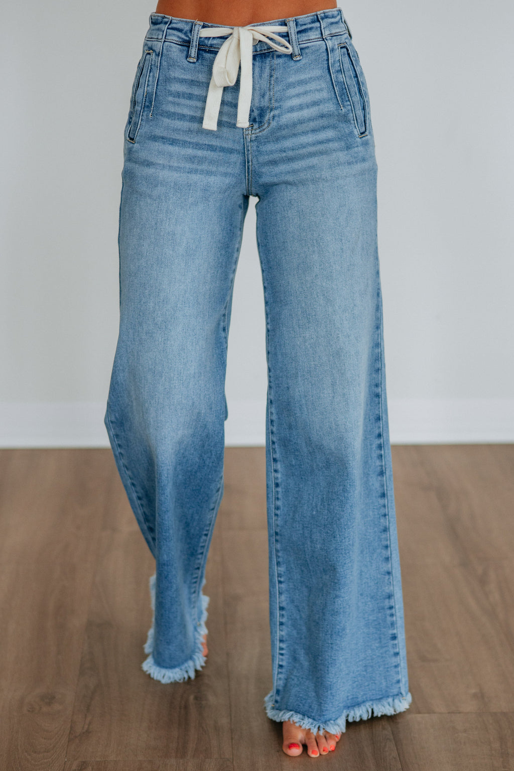 High Rise Wide Leg Drawstring Raw Hem Long Inseam Jeans in Medium Wash