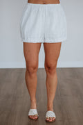 High Rise Embroidered Ruffled Cotton Shorts in Ivory