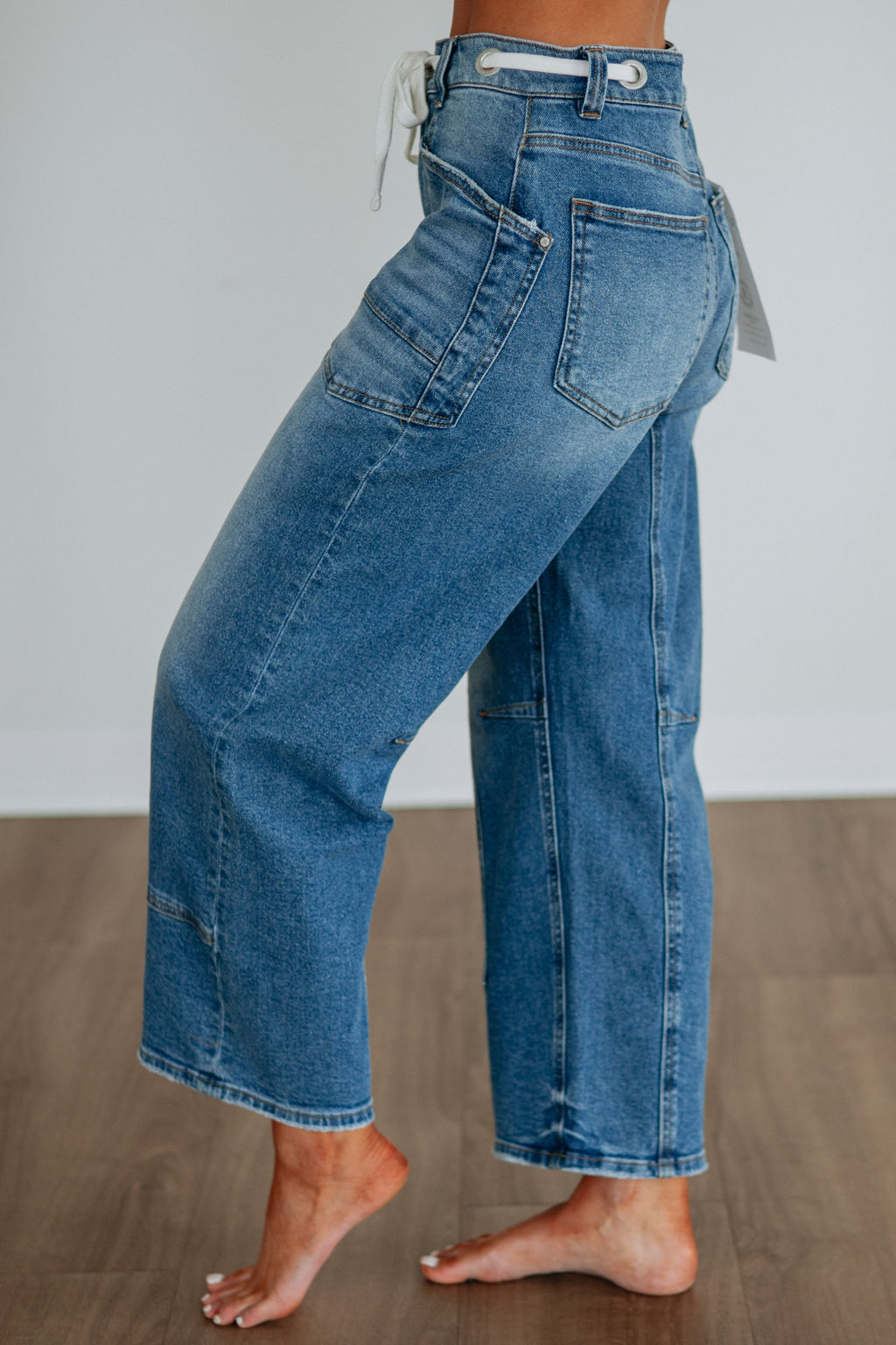 High Rise Barrel Leg Grommet Drawstring Cropped Jeans in Medium Wash