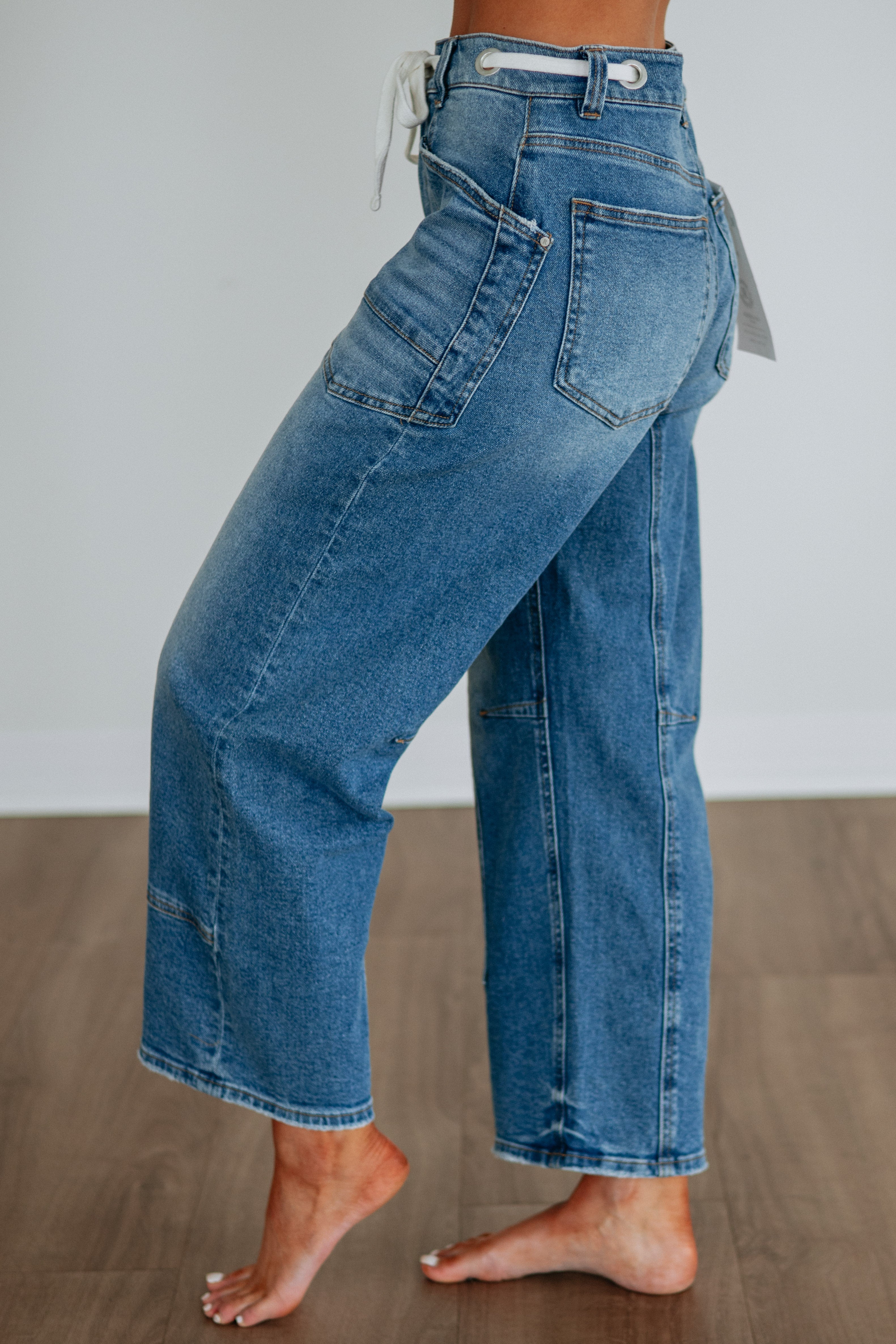 High Rise Barrel Leg Grommet Drawstring Cropped Jeans in Medium Wash